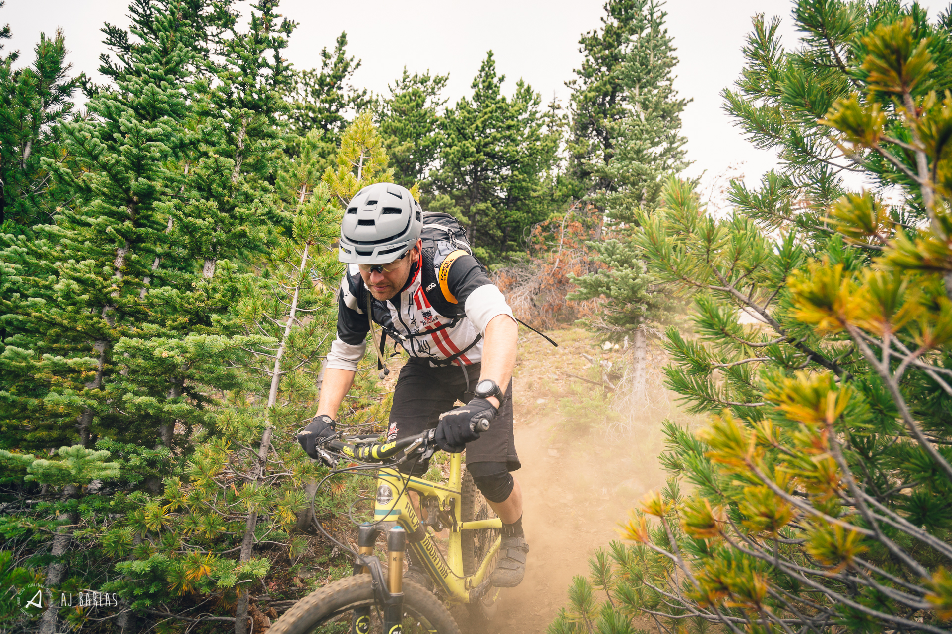 It may have snowed up top, but it was still dusty on the trails. Jeff makes his way through.