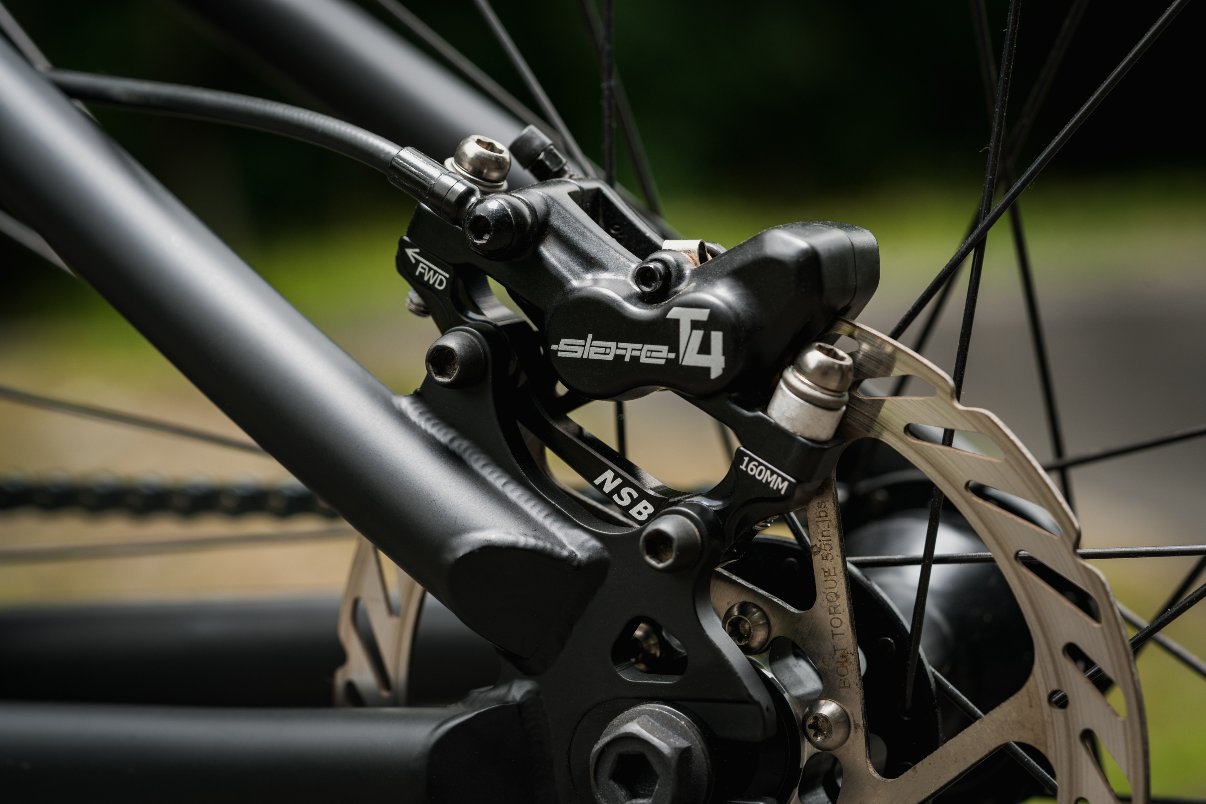 Transition PBJ TRP Slate brakes with NSBillet IS brake adapter shot by A.J. Barlas at the Squamish Casino pumptrack